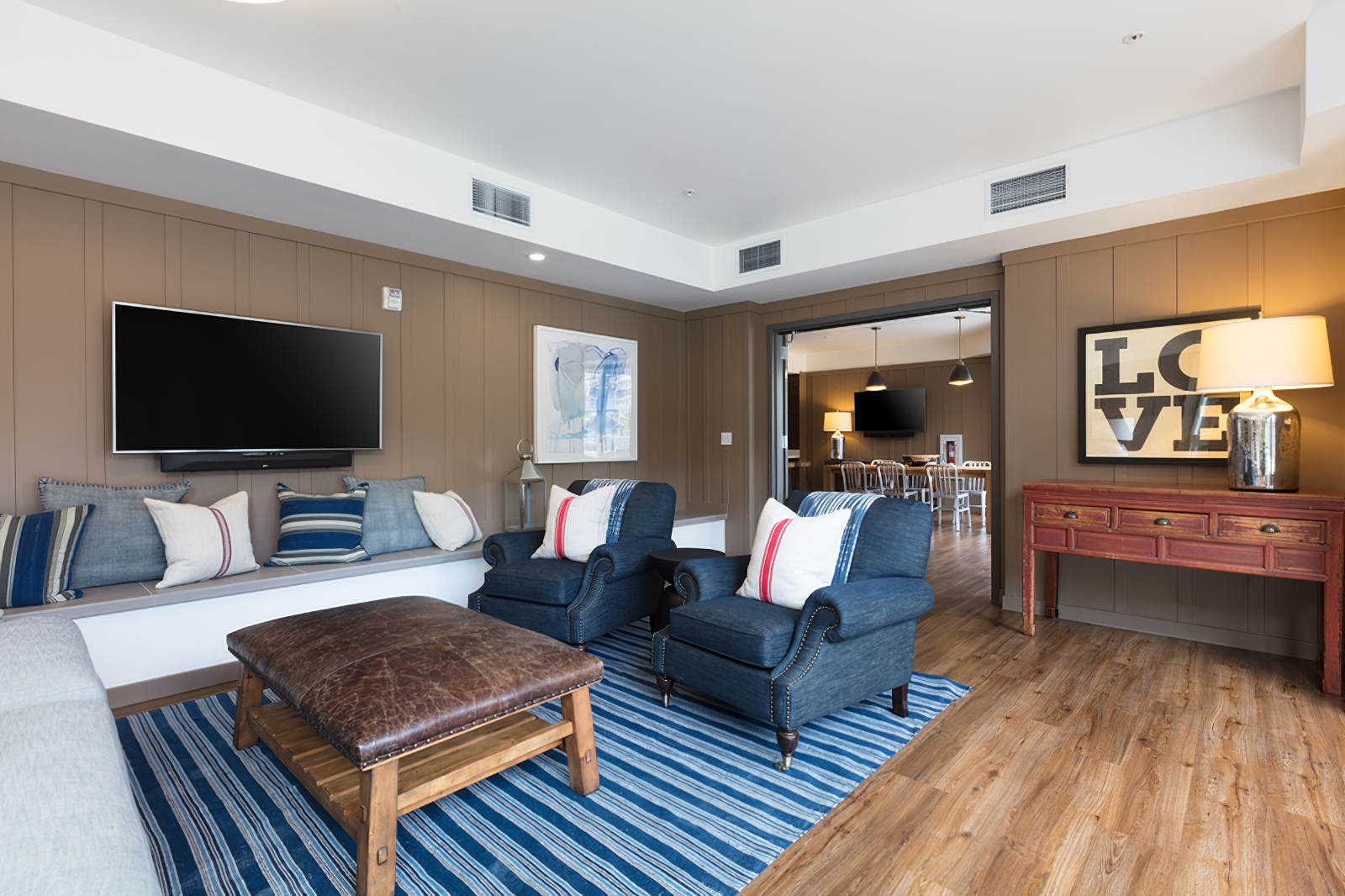 clubhouse with lounge seating, tv, and decor